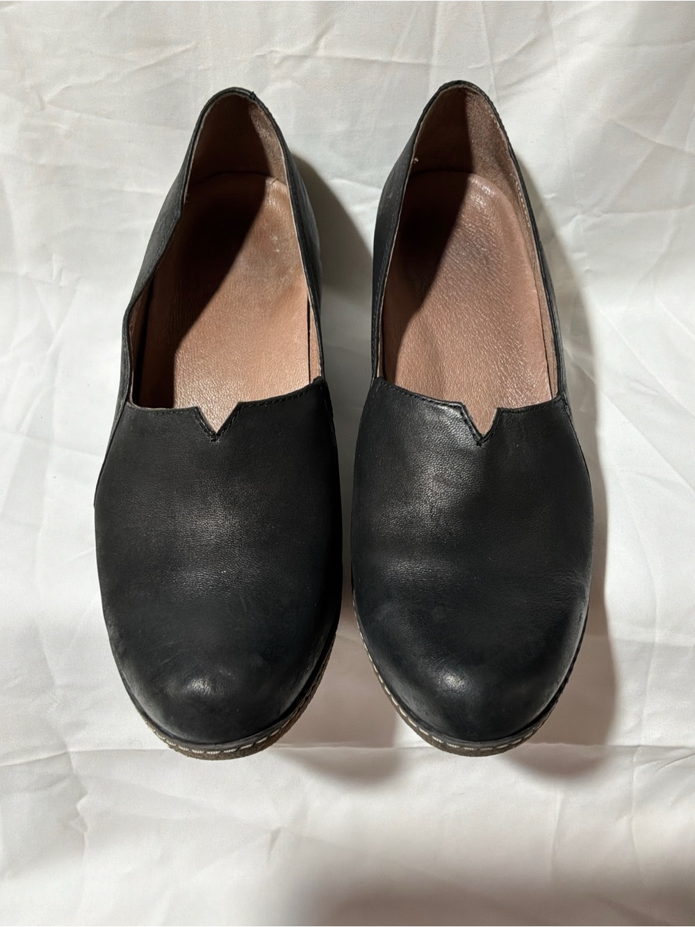 Dansko Black Leather Slip-On Flats with Notch Vamp